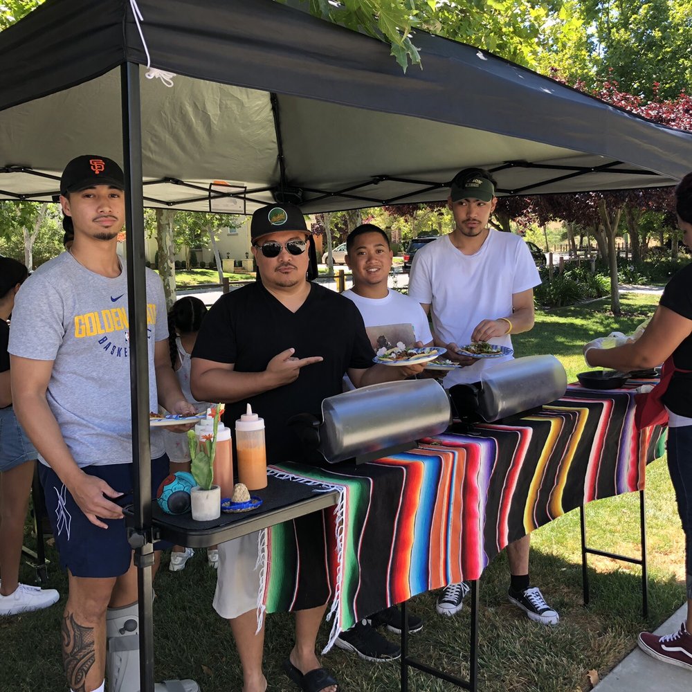 Teo's Mobile Tacos - The boys enjoying the spread! - Street Vendors Near Me