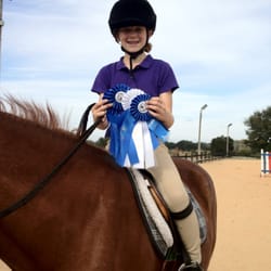 DreamCatcher Horse Ranch and Rescue Center - Little emmie with her ribbons