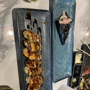 Koi Sushi - Baked mussels smother with imitation crab meat and yellow tail hand roll. - Sushi Bars Near Me - Tempe, Arizona Koi Sushi - Baked mussels smother with imitation crab meat and yellow tail hand roll. - Sushi Bars Near Me - Tempe, Arizona