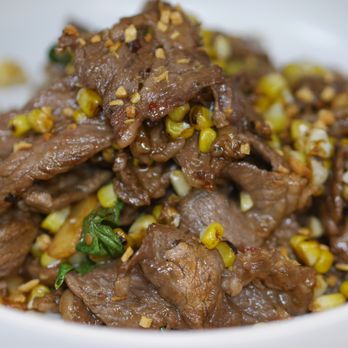 Koon Thai Eatery - beef and corn in a white bowl - Thai Near Me - Hillsdale, New Jersey Koon Thai Eatery - beef and corn in a white bowl - Thai Near Me - Hillsdale, New Jersey
