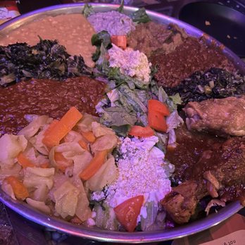 Cafe Colucci - Vegan platter (left) Meat platter (right) - Ethiopian Near Me - Oakland, California