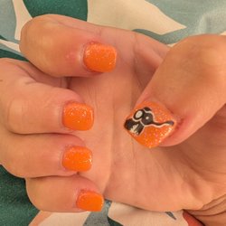 Acute Nails Spa - Salmon/Coral pink with cute elephant design acrylic nails done by Hai