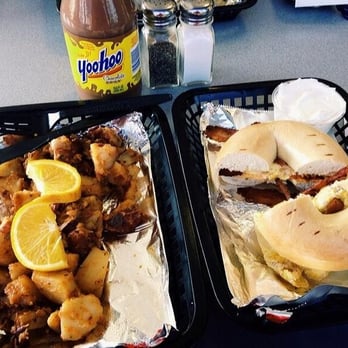 Bagel Cafe - Plain bagel with bacon, egg, and cheese with a side of home fries. - Bagels Near Me - Herndon, Virginia