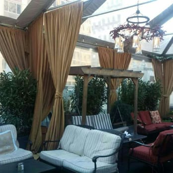 Refinery Rooftop - Outdoor area that's covered in the winter. - Lounges Near Me - New York, New York Refinery Rooftop - Outdoor area that's covered in the winter. - Lounges Near Me - New York, New York