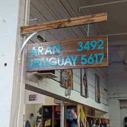 Grafton Yarn Store - The street sign tells you what's in the bins in that row ...