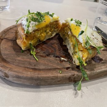 Krasi - PITA fresh-baked savory pie with fried egg - Mediterranean Near Me - Boston, Massachusetts Krasi - PITA fresh-baked savory pie with fried egg - Mediterranean Near Me - Boston, Massachusetts