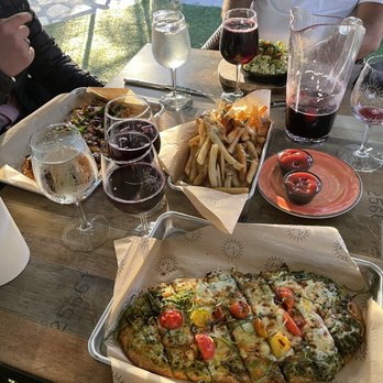Miramonte Winery - Caprese flatbread, BBQ chicken flatbread, truffle garlic fries, pesto mac, and sangria - Wineries Near Me - Temecula, California