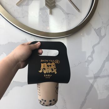 Snow Tea - The handle with their logo on it. - Bubble Tea Near Me - Scarborough, Ontario