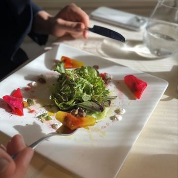 BCN Taste & Tradition - Beet-pistachio-raspberry ravioli salad, kefir cheese, and pistachio oil - Catalan Near Me - Houston, Texas