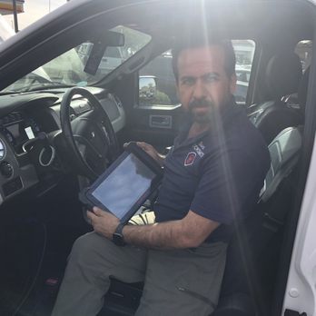 Sam's Locksmith - Sam working on programming the chip in my key fob. - Keys & Locksmiths Near Me - San Diego, California