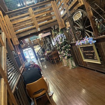Brothers Cafe - a man sitting at a table in a restaurant - Burgers Near Me - Greenville, Texas Brothers Cafe - a man sitting at a table in a restaurant - Burgers Near Me - Greenville, Texas
