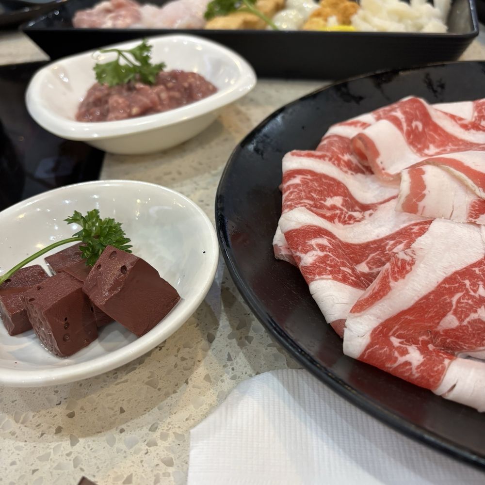 Assorted hotpot fare. Assorted hotpot fare.