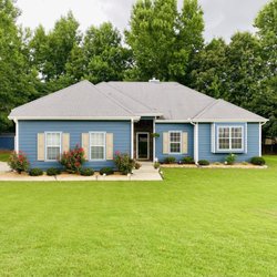 Golden Season Landscaping - Removed mulch, replaced with pea gravel, added landscaping stones and a hydrangea, golden mop, and loropetalum for color