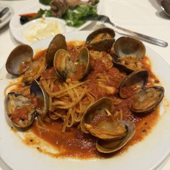 Assaggio Bistro - Fresh Clams Lightly Pan Fried in Olive Oil and Garlic, with Light Wine Butter Sauce. Served over Linguine. Tomato Sauce - Italian Near Me - Honolulu, Hawaii Assaggio Bistro - Fresh Clams Lightly Pan Fried in Olive Oil and Garlic, with Light Wine Butter Sauce. Served over Linguine. Tomato Sauce - Italian Near Me - Honolulu, Hawaii