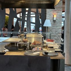 Kreutzers Restaurant - Chef's counter. Watching him grill the e food