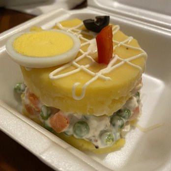Rosario's Peruvian Restaurant - Causa - chicken salad between two layers of mashed potatoes - Peruvian Near Me - Longmont, Colorado Rosario's Peruvian Restaurant - Causa - chicken salad between two layers of mashed potatoes - Peruvian Near Me - Longmont, Colorado