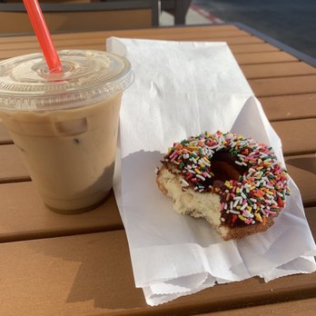 Randy's Donuts - iced carmel coffee with chocolate sprinkle donut - Donuts Near Me - Downey, California Randy's Donuts - iced carmel coffee with chocolate sprinkle donut - Donuts Near Me - Downey, California