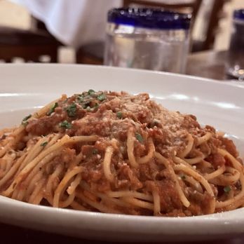 Brio Italian Grille - Spaghetti Bolognese was well flavored and fresh ground Parmesan - Italian Near Me - Irvine, California