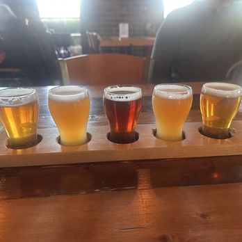 Drafting Table Brewing Company - A flight of IPA's plus an orange brewlius. - Breweries Near Me - Wixom, Michigan