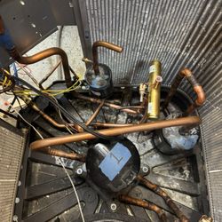 Center for Employment Training - Changing out a reversing valve