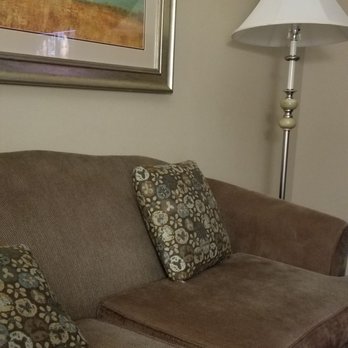 WeStay Suites - Couch and clean deco - Hotels Near Me - Covington, Louisiana WeStay Suites - Couch and clean deco - Hotels Near Me - Covington, Louisiana