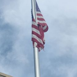 Bank of America Financial Center - Faded, torn American flag in OUR country is never acceptable!
