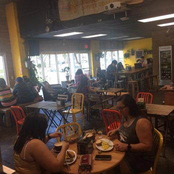 Macondo Coffee Roasters - Zoom in.. There's n artist drawing someone - Coffee & Tea Near Me - Doral, Florida