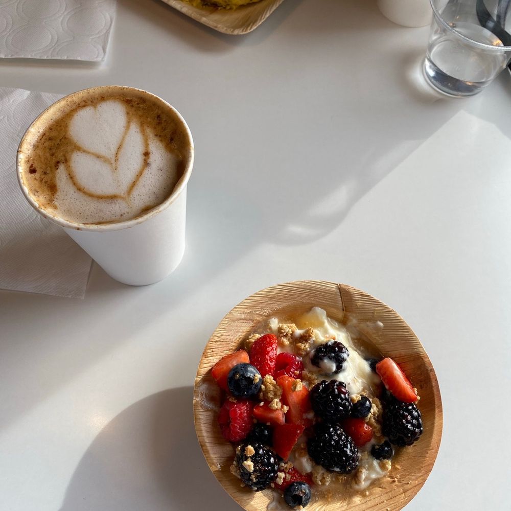 a bowl of oatmeal and a cup of coffee a bowl of oatmeal and a cup of coffee