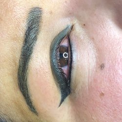 Red Scissors - Permanent eyeliner done by Sha