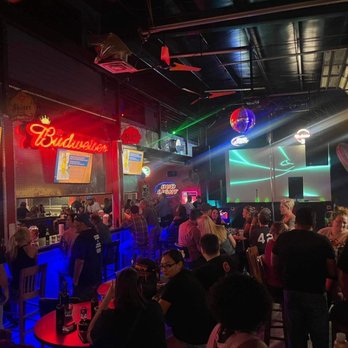 Ol' Mothers Speakeasy - crowded bar with neon signs - New American Near Me - Bacliff, Texas Ol' Mothers Speakeasy - crowded bar with neon signs - New American Near Me - Bacliff, Texas
