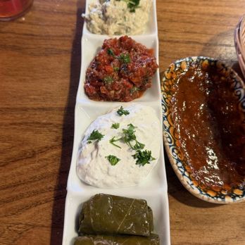 Chef’s Table - Mixed appetizer plate (top to bottom): babaganoush, muammara, lebni, and Dolma - Mediterranean Near Me - San Antonio, Texas