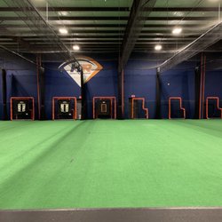 Hampton Roads Sports Academy - Playing surface, the nets pull back to create 7 full size batting cages.