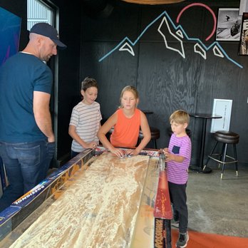 Tips Up - Shuffle board - Bars Near Me - Big Sky, Montana Tips Up - Shuffle board - Bars Near Me - Big Sky, Montana