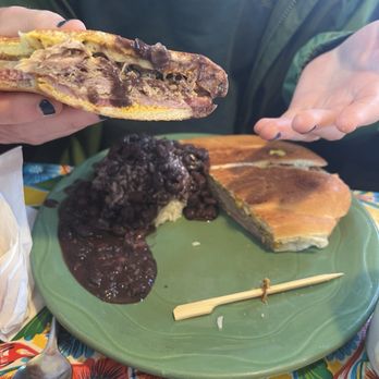 Victor's 1959 Cafe - Sandwich cubano ($18) with rice and beans. - Cuban Near Me - Minneapolis, Minnesota