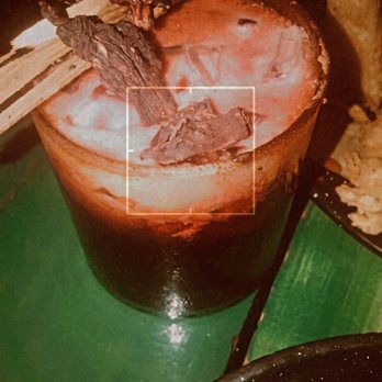 Zitla - They light the cinnamon stick on fire in front of you! Drink is Mal de Amores. - Mexican Near Me - Playa del Carmen, ROO