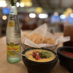 Loaded queso and a cold Topo! Loaded queso and a cold Topo!