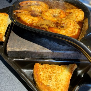 Black Rock Bar & Grill - Shrimps bubbling~ in their special cajun butter sauce - Bars Near Me - Beavercreek, Ohio