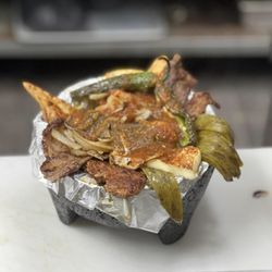 La suerte de sake Mexican restaurant and grill - Molcajete