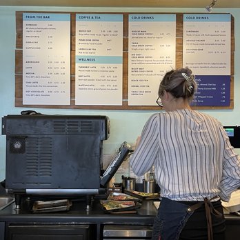Retrograde Coffee Roasters - a woman preparing food - Coffee Roasteries Near Me - Sebastopol, California