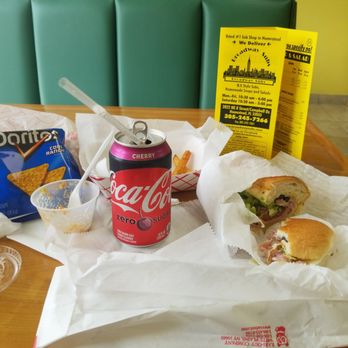Broadway Subs - a soda and a sandwich on a table - Delis Near Me - Homestead, Florida Broadway Subs - a soda and a sandwich on a table - Delis Near Me - Homestead, Florida