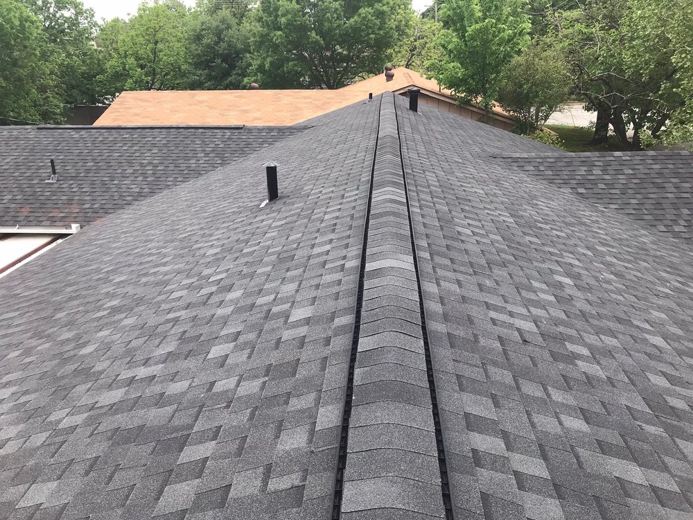 Slide of Humberto's Roofing Service