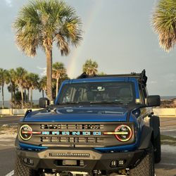 Karl Flammer Ford - Morimoto headlights, Rough Country Bumper, oracle bronco letter lights.