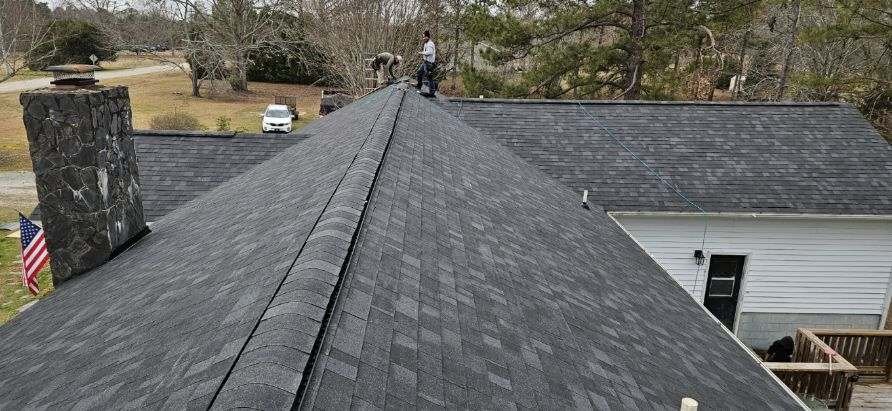 Slide of C & V Roofing