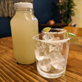 Doña - Margarita Especial. 16 oz bottle for $26. El Destilador Blanco Tequila, triple sec, lime juice - on the rocks. - Mexican Near Me - Oakland, California Doña - Margarita Especial. 16 oz bottle for $26. El Destilador Blanco Tequila, triple sec, lime juice - on the rocks. - Mexican Near Me - Oakland, California