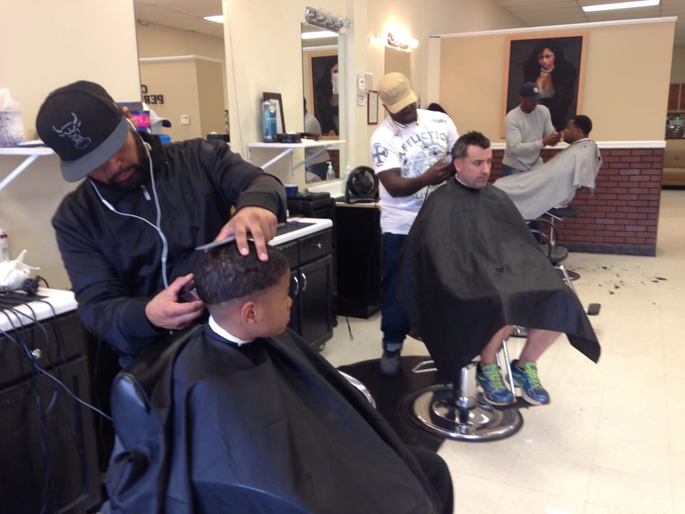 Ness the Barber Logo