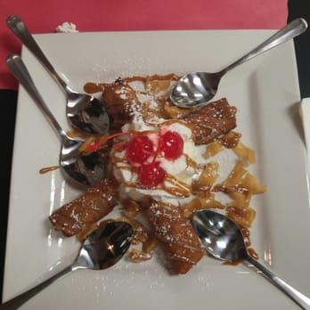Sizzling Kitchen - Banana Egg Rolls with Coconut Ice Cream - Italian Near Me - Lowell, Massachusetts Sizzling Kitchen - Banana Egg Rolls with Coconut Ice Cream - Italian Near Me - Lowell, Massachusetts