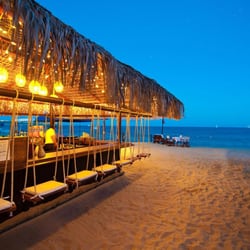 AST Travel Agency - Swing at the beach bar- Medano beach, Cabo San Lucas