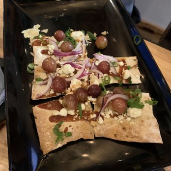 Grinning Mule Saloon and Kitchen - Grapes/bbq flat bread - Bars Near Me - Charlotte, North Carolina
