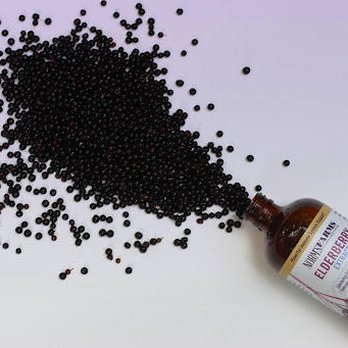 Norm's Farms - a bottle of blackberries spilling out of it - Specialty Food Near Me - Purdy, Missouri Norm's Farms - a bottle of blackberries spilling out of it - Specialty Food Near Me - Purdy, Missouri