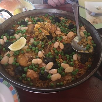 Paella - Rabbit and snail paella - Spanish Near Me - Norwalk, Connecticut Paella - Rabbit and snail paella - Spanish Near Me - Norwalk, Connecticut